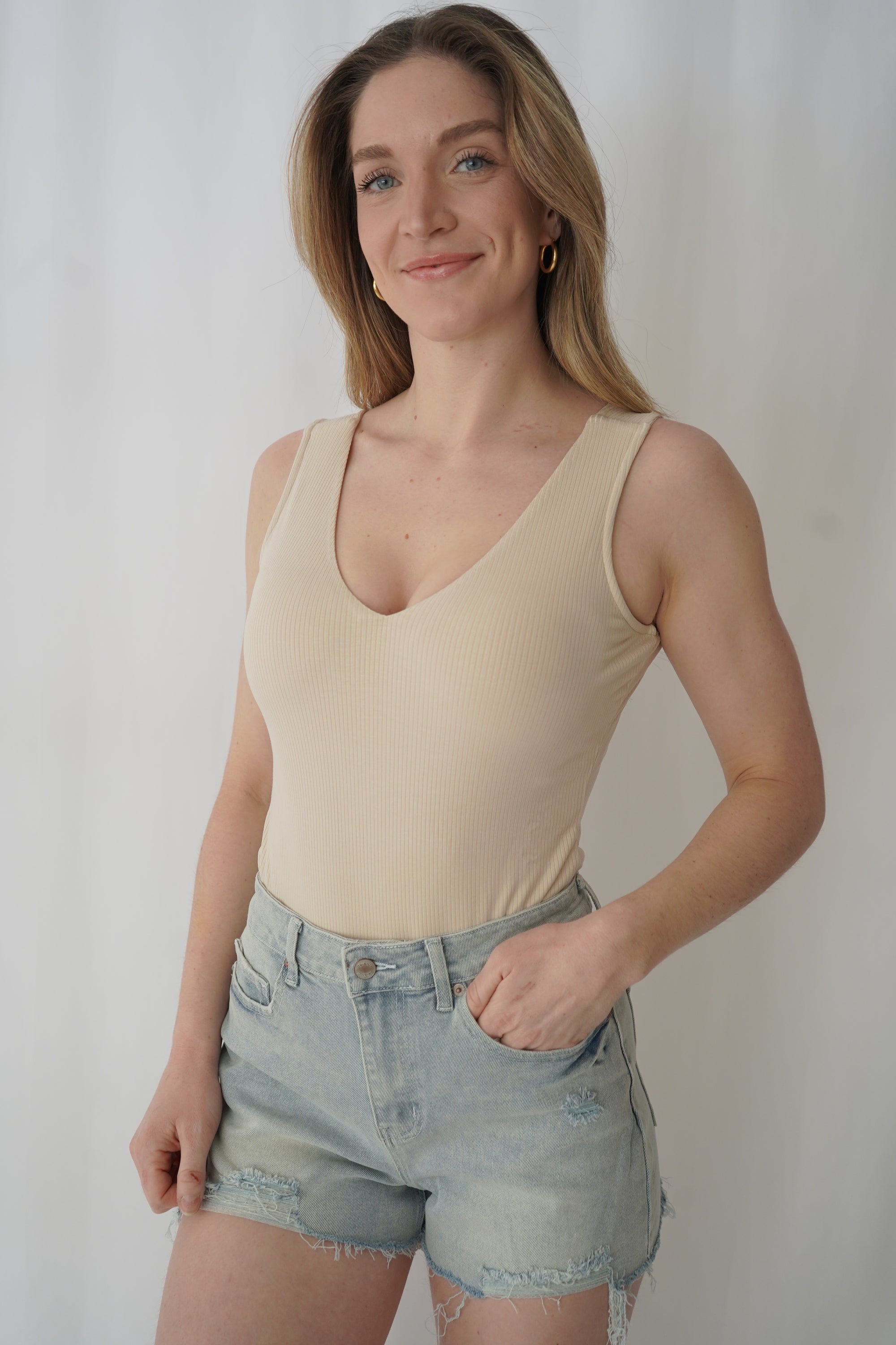Bodysuit en rib col en V beige