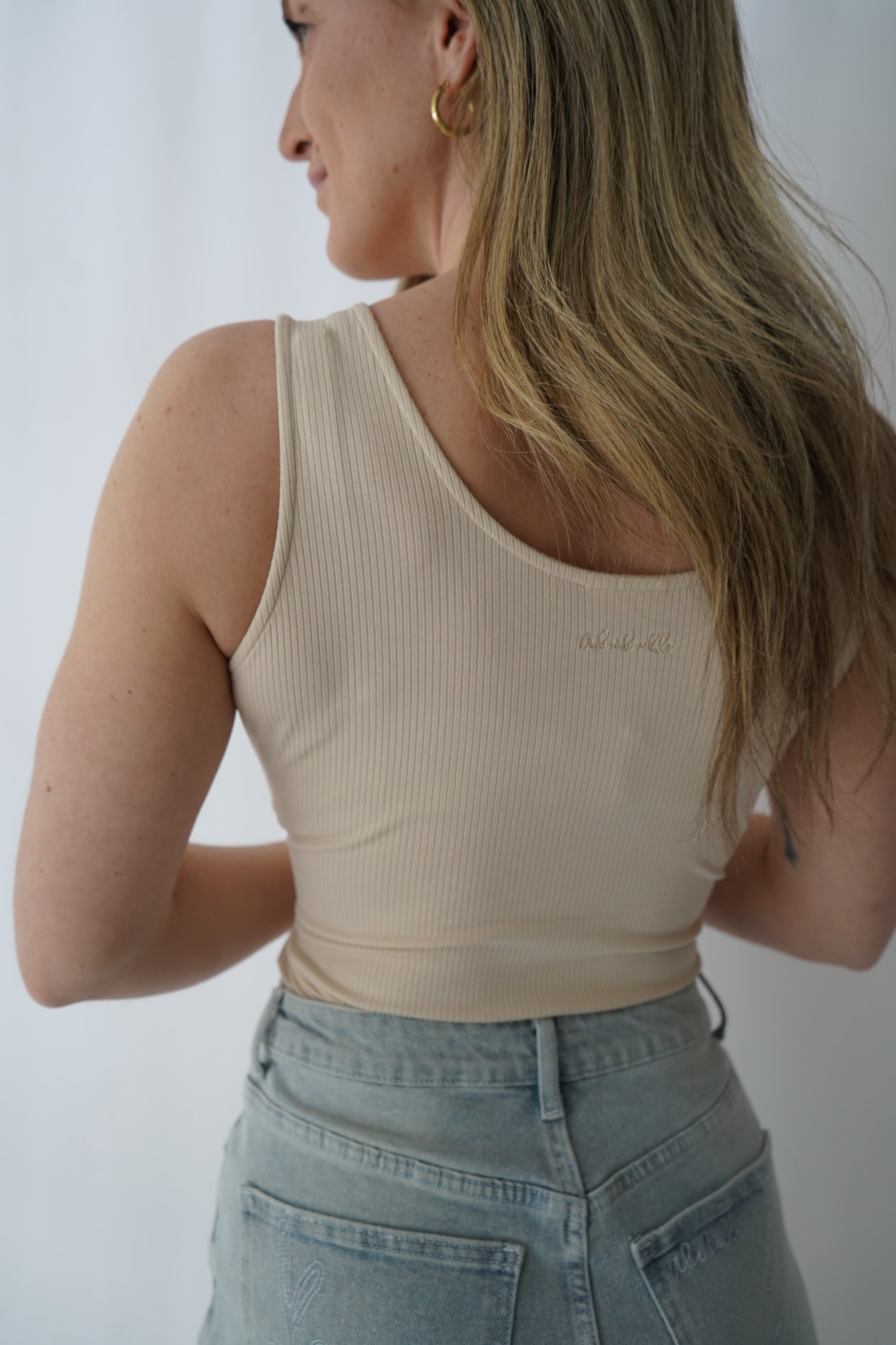 Bodysuit en rib col en V beige