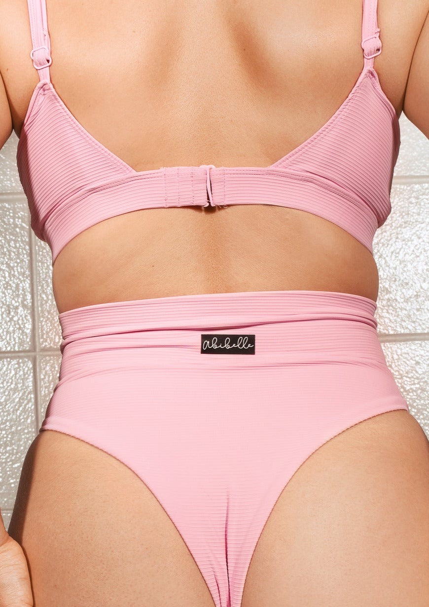 Haut de maillot soutenant rose