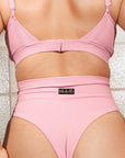 Haut de maillot soutenant rose