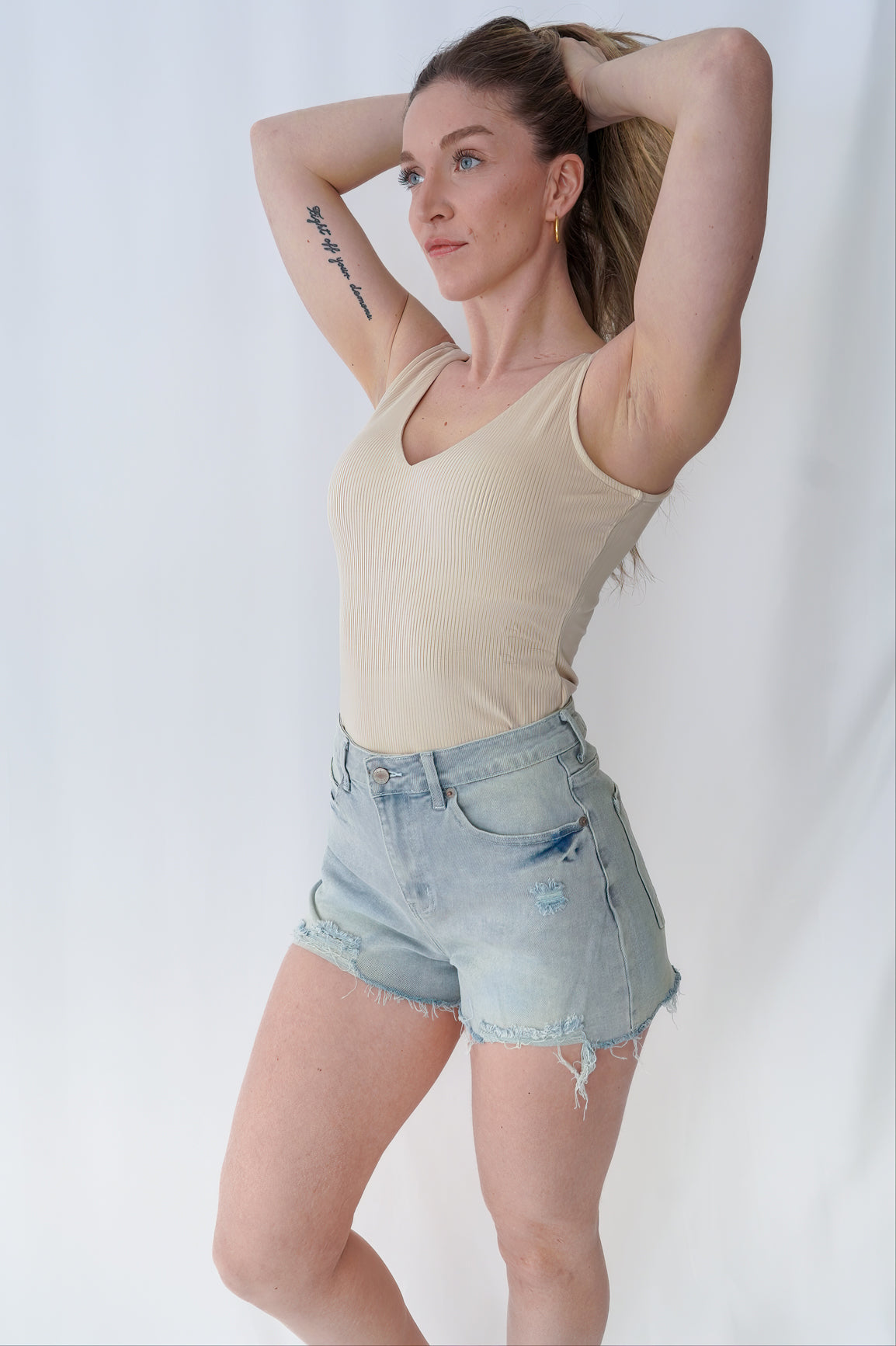 Bodysuit en rib col en V beige